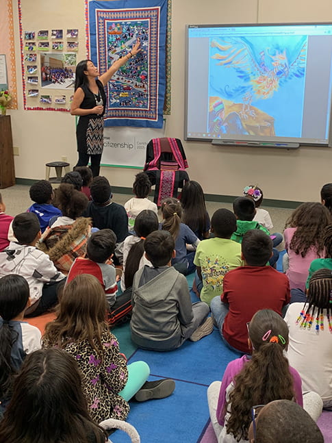 See Lor presenting The Forbidden Treasure to Elementary students 